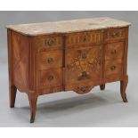 An early 20th century French kingwood and marquetry inlaid commode, the shaped Brèche d'Alep