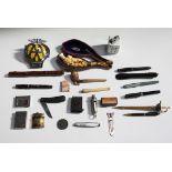 A group of various collectors' items, including a 19th century meerschaum pipe, a selection of