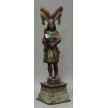 A 20th century moulded and painted composition advertising figure of a female Native American