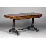 A Regency rosewood library table, the rectangular top above two cushion frieze drawers, raised on