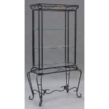 A modern wrought iron display stand, fitted with glass shelves, on cabriole legs, height 195cm,
