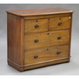 A Victorian mahogany chest of two short and two long drawers, raised on bun feet, height 86cm, width