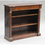 A Regency rosewood open bookcase, the beaded panel frieze above adjustable shelves flanked by half-