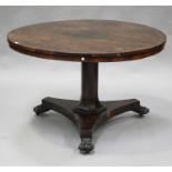 A Regency rosewood tip-top breakfast table, the circular top above a flared octagonal stem