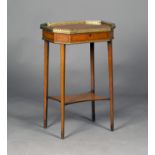 An early 19th century burr maple and brass mounted work table, the canted rectangular hinged top