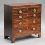 A 19th century mahogany and crossbanded chest of two short and three graduated long drawers, on