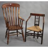 A late 19th century beech and elm bar back Windsor armchair, the solid seat on turned legs, height