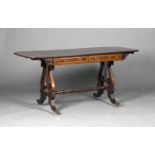 A Regency mahogany sofa table, the hinged top with a bird's eye maple and rosewood crossbanded