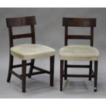 A set of ten George III provincial mahogany bar back dining chairs with plain centre rails, the