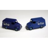 Two Dinky Toys No. 31d Trojan vans 'Oxo', one finished in violet blue, the other in mid-blue (some