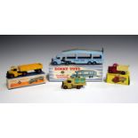 Four Dinky Toys and Supertoys Bedford vehicles, comprising a No. 410 end tipper, a No. 521