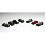 Seven Dinky Toys cars, comprising a No. 36d Rover saloon, a No. 36b Bentley, a No. 36c Humber Vogue,