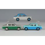 Three Dinky Toys duo coloured cars, comprising a No. 166 Sunbeam Rapier, finished in blue and