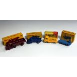 Four Dinky Toys vehicles, comprising a No. 412 Austin Wagon, a No. 400 B.E.V. electric truck, a