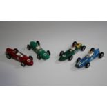 Four Dinky Toys racing cars, comprising a No. 240 Cooper, a No. 241 Lotus, a No. 242 Ferrari and a