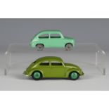 A Dinky Toys No. 181 Volkswagen Beetle, finished in green, and a No. 183 Fiat 600, finished in