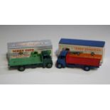 A Dinky Supertoys No. 512 Guy flat truck, first type, finished in blue with red flatbed, within a