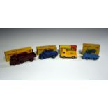 Three Dinky Toys emergency vehicles, comprising two No. 253 Daimler ambulances, one finished in