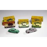 Four Dinky Toys duo coloured cars, comprising a No. 154 Hillman Minx, finished in green and cream, a