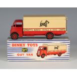 A Dinky Toys No. 917 Guy van, first type, 'Spratts', with blue and white striped box (some paint