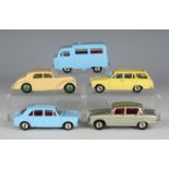 Four Dinky Toys cars, comprising a No. 140 Morris 1100, a No. 141 Vauxhall Victor estate car, a