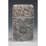 A Victorian silver rectangular vesta case with overall engraved scroll decoration, the top with