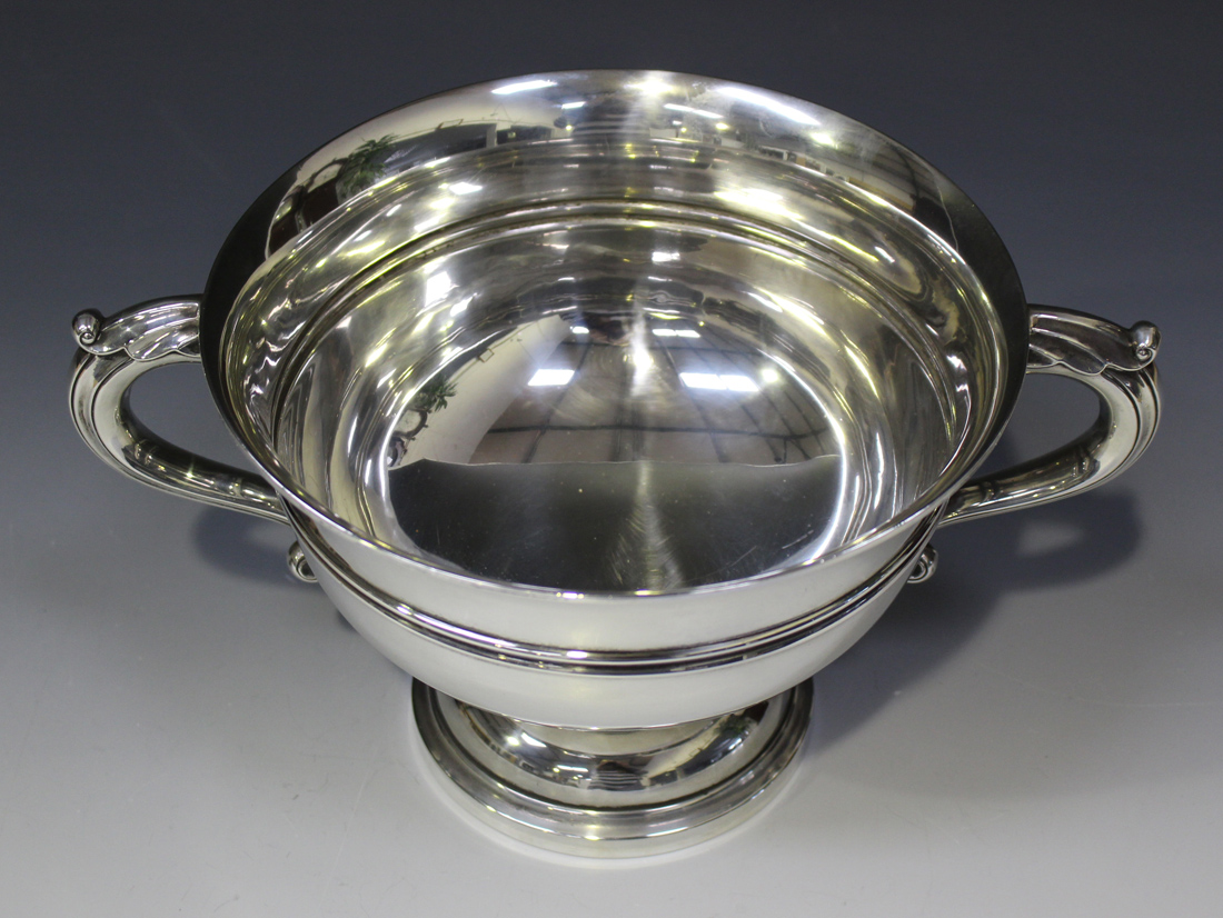 A George V silver two handled trophy cup, the circular body flanked by a pair of foliate capped - Image 2 of 3