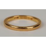 A 22ct gold plain wedding ring Birmingham 1929, ring size approx O1/2.Buyer’s Premium 29.4% (