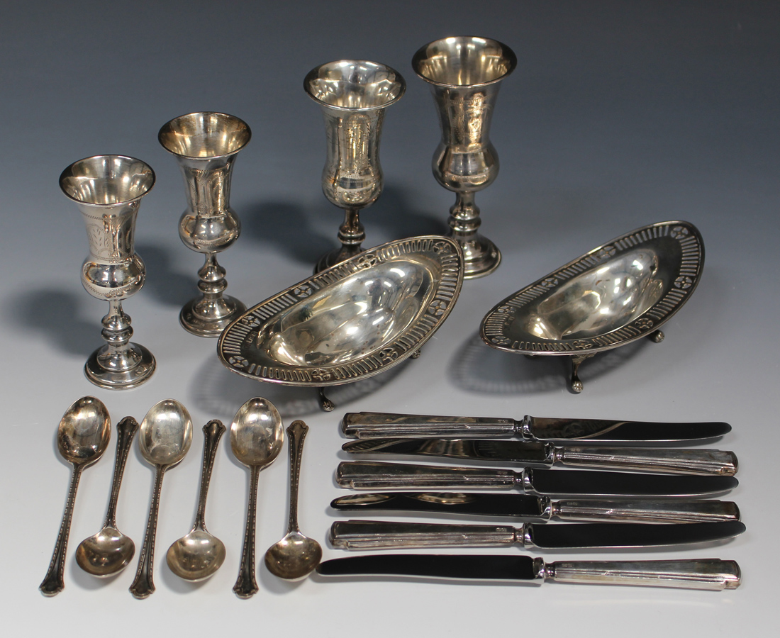 A pair of late Victorian silver oval bonbon dishes, each with pierced cross and vertical line