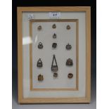 A group of six Edwardian gold and seven silver fishing creel fob pendants and charms, each with