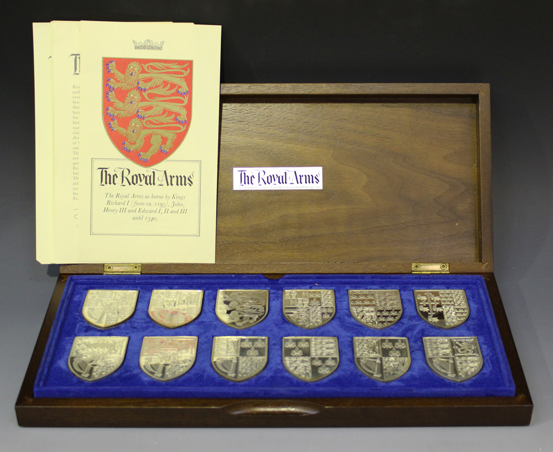 A set of twelve silver 'The Royal Arms' shield shaped ingots, commemorating Queen Elizabeth II