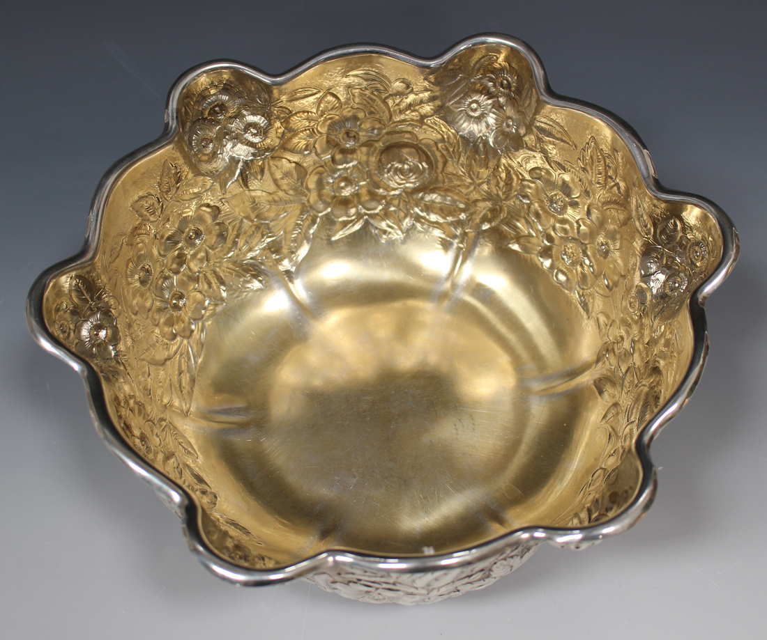 An early 20th century American sterling bowl of lobed form with wavy rim, decorated in relief with - Image 2 of 4