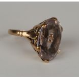 A gold ring, claw set with an oval cut pale amethyst, detailed '9ct', ring size approx I.Buyer’s