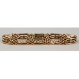 A gold, turquoise and seed pearl set bar and oval link gate bracelet on a snap clasp, detailed '