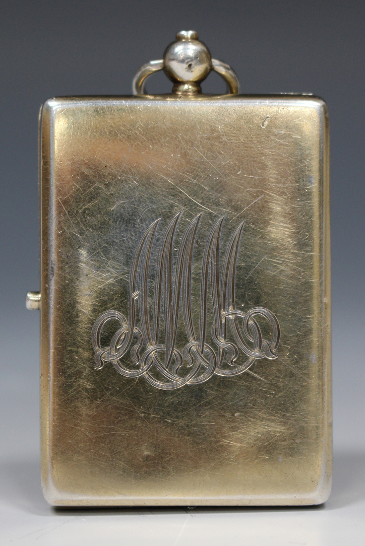 A George V silver gilt and lilac enamel rectangular compact, hinged to reveal a mirror and oval - Image 2 of 5