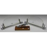 A pair of Brooklands type aero screens with aluminium frames and mounting brackets, width 40cm,