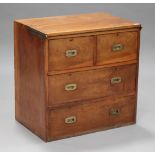 A late 19th century camphor campaign chest of two short and two long drawers with brass recessed