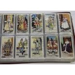 A set of fifty Wills Military Motors cigarette cards, a set of fifty Players Aircraft of the Royal