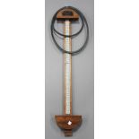 A Turners Cord V Belts wall mounted measure with inset ivorex scale and applied maker's plaque,