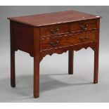 A 19th century mahogany side table, fitted with two short and a long drawer, on block legs, height