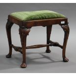 A 20th century Queen Anne style walnut stool with drop-in seat, raised on carved cabriole legs and