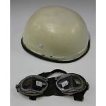 A Continental style motor cycle crash helmet, finished in white, together with a pair of Stadium