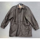 A Burberry brown leather gentleman's jacket with Haymarket check lining.Buyer’s Premium 29.4% (