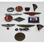 A collection of radiator badges, including Austin Healey, Morgan 4.4, Wolseley, Jowett Javelin,