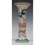 A Chinese famille rose enamelled porcelain beaker vase, mark of Qianlong but 20th century, decorated