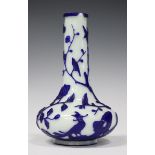 A Chinese Peking blue on white overlay glass bottle vase, Qing dynasty, the low bellied body and