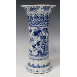 A Chinese blue and white porcelain beaker vase, mark of Kangxi but late 19th century, the spiral