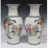 A pair of Chinese famille rose porcelain vases, probably Republic period, each baluster body