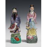 A Chinese famille rose enamelled biscuit porcelain figure of an immortal, 20th century, modelled