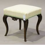 An early Victorian rosewood stool, the seat upholstered in a checked damask, raised on carved